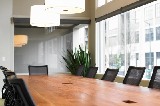 Conference table and chairs in boardroom