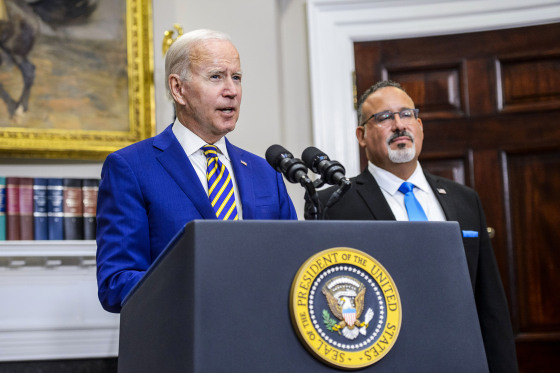 President Joe Biden speaks alongside Secretary of Education Miguel Cardona in the Roosevelt Room of the White House on Aug. 24, 2022.