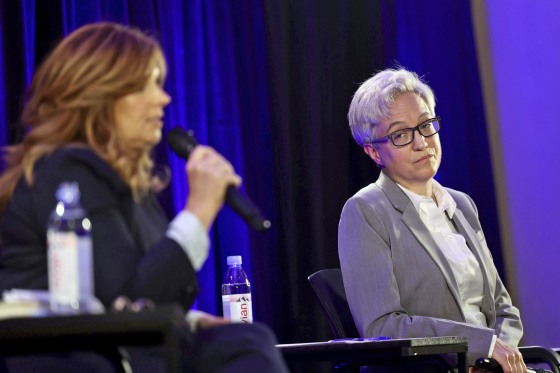 Democratic nominee Tina Kotek, right, listens to Republican nominee Christine Drazan during a gubernatorial debate in Welches, Ore., on July 29. 