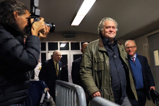 Steve Bannon walking out of the court building.