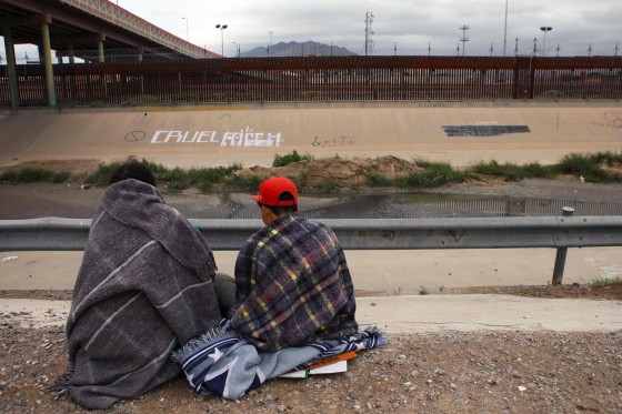 Venezuelan migrants rest on the banks of the Bravo river after being expelled from the United States, in Chihuahua, Mexico