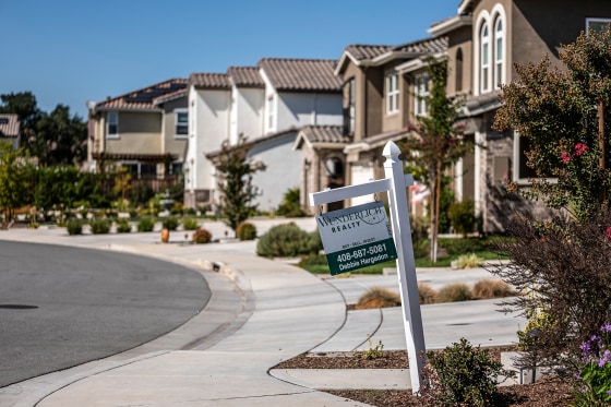 A realty sign outside a home in Morgan Hill, Calif., on Oct. 4, 2022.