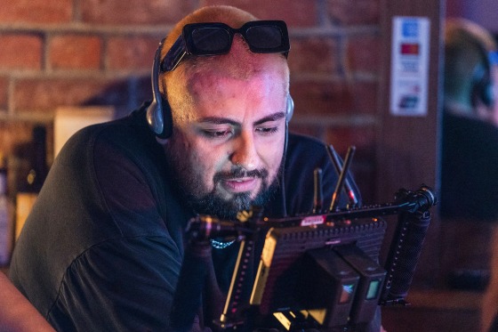 Jorge Xolalpa, a 33-year-old movie director from Mexico, checks a shot on a monitor during the filming of his latest movie "Union Station" in West Hollywood, Calif., on Oct. 4, 2022.
