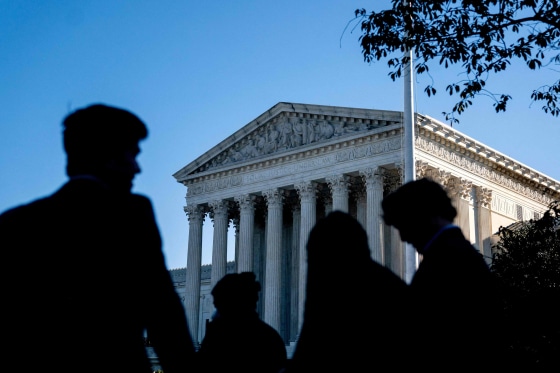 People wait in line outside the Supreme Court on Oct. 11, 2022.