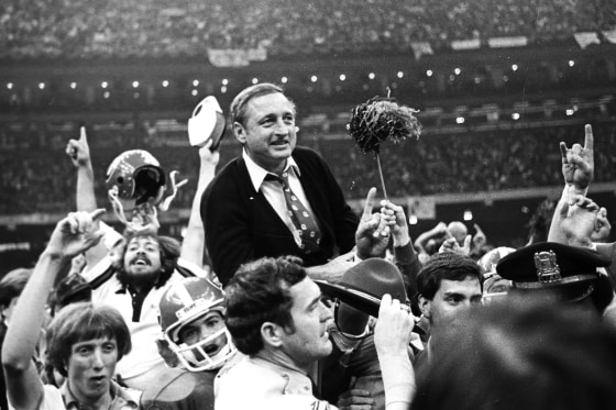 FILE - Georgia football coach Vince Dooley is carried off the field after Georgia defeated Notre Dame 17-10 in the Sugar Bowl college football game Jan. 1, 1981, in New Orleans. Dooley loves history _ especially the kind he says favors his beloved Bulldogs. Dooley believes a rematch will work in Georgia's advantage against Alabama in the College Football Playoff title game on Monday night in Indianapolis. Dooley also has faith Georgia's defense will fare better in its second chance against Alabama quarterback Bryce Young. (AP Photo/Gene Blythe, File)