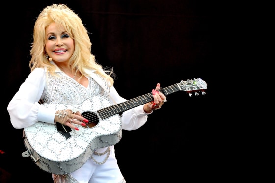 GLASTONBURY, ENGLAND - JUNE 29:  Dolly Parton performs on The Pyramid Stage on Day 3 of the Glastonbury Festival at Worthy Farm on June 29, 2014 in Glastonbury, England.  (Photo by Shirlaine Forrest/WireImage)