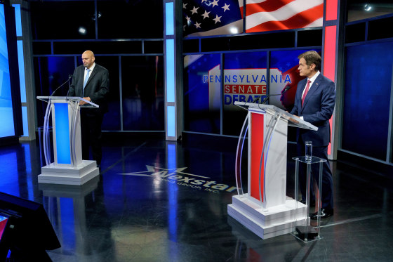 Democratic candidate Lt. Gov. John Fetterman, left, and Republican Pennsylvania Senate candidate Mehmet prior to their debate in Harrisburg on Oct. 25, 2022.