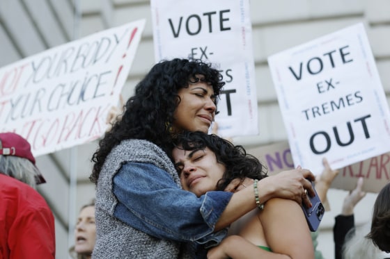 Mitzi Rivas hugs her daughter Maya Iribarren at an abortion-rights protest at San Francisco City Hall after the Supreme Court overturned Roe v. Wade on June 24.