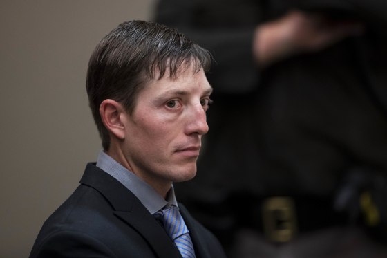 Former police officer Christopher Schurr appears for a court hearing at the Kent County Courthouse in Grand Rapids, Mich., on Oct. 26, 2022.