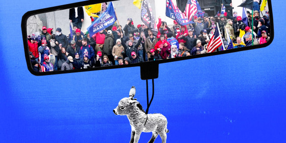 Photo Illustration: A donkey charm hands from a rearview mirror, reflecting a scene from the Jan. 6 riot at the Capitol