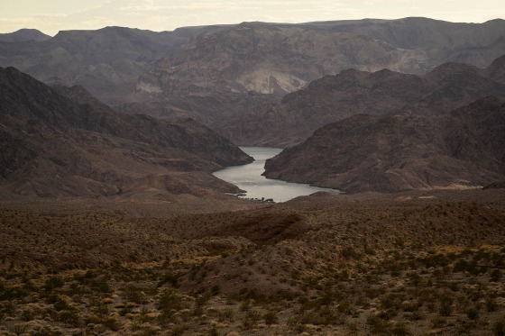 Water flows down the Colorado River downriver from the Hoover Dam in northwest Arizona on Aug. 14.
