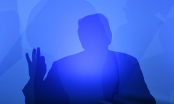 Image: President Donald Trump casts a shadow as he addresses a press conference on the second day of the North Atlantic Treaty Organization summit in Brussels