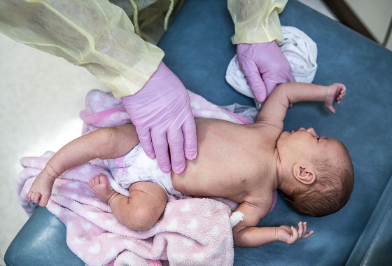 Dr. Vainio, MD examined two-month old Eden Smith, who developed respiratory symptoms a few days ago and was tested for the flu, Covid-19 and RSV.