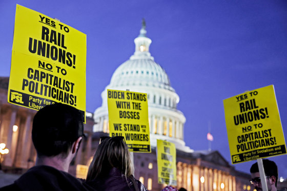 Activists in support of unionized rail workers protest outside the Capitol