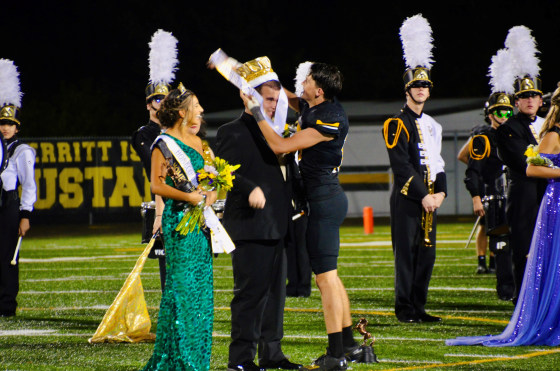 Crestview High School football player wins homecoming queen with trumpet  player king