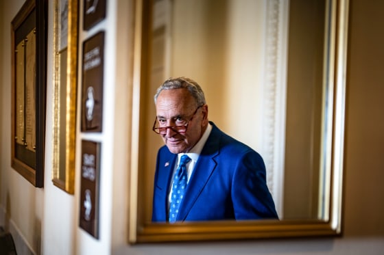 Senate Majority Leader Chuck Schumer, D-N.Y., departs a news conference at the U.S. Capitol on Sunday, Aug. 7, 2022.