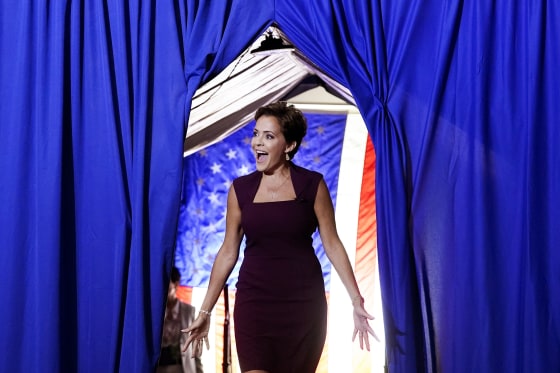 Republican candidate for Arizona governor Kari Lake arrives on stage at a Save America Rally Prescott