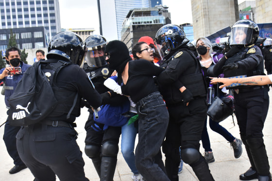 Demonstrators clash with police during an abortion right's protest marking International Safe Abortion Day in Mexico City on Sept. 28, 2022.