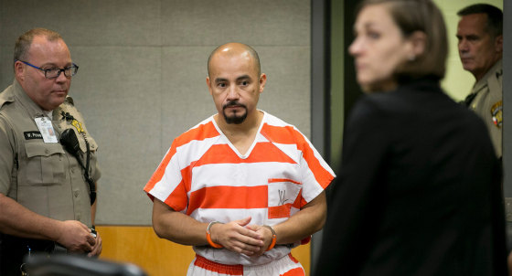 Image: Areli Escobar enters the courtroom for a hearing to discuss his capital murder conviction at the Blackwell-Thurman Criminal Justice Center.