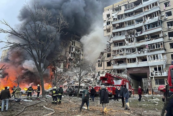 Smoke rises after a Russian rocket hit a multistory building in Dnipro, Ukraine 