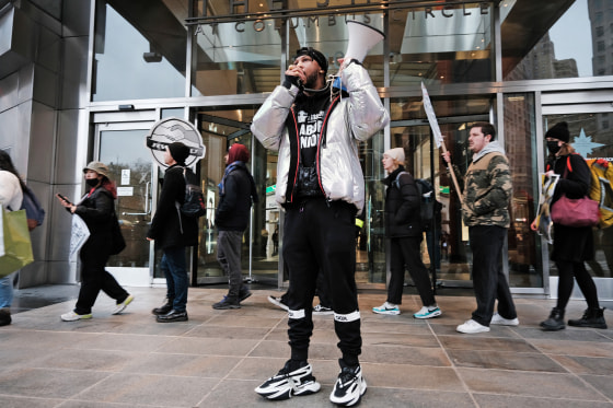 Labor activist Chris Smalls joins members of the Amazon labor union and others for a protest outside of the New York Times DealBook Summit on Nov. 30, 2022 in New York.