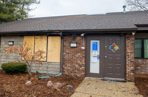 A front window is boarded up at the Planned Parenthood Health Center in Peoria, Ill., on Jan. 15, 2023.