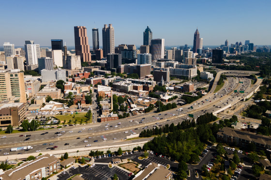 Vehicles travel along a highway in Atlanta