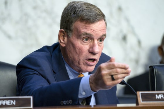 Sen. Mark Warner, D-Va., questions the panel during a Senate Banking Committee annual Wall Street oversight hearing on Sept. 22, 2022.
