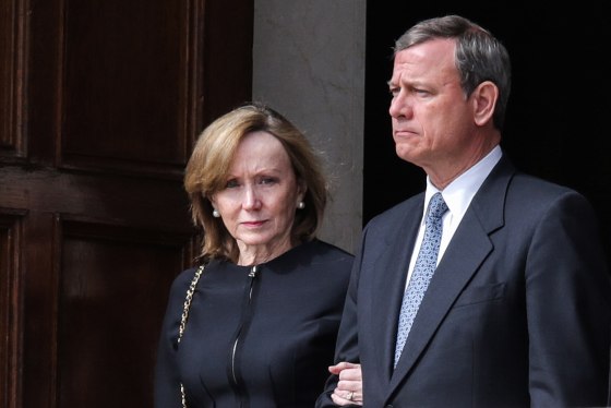Supreme Court Chief Justice John Roberts and his wife Jane Roberts leave the Basilica of the National Shrine of the Immaculate Conception following the funeral of Associate Justice Antonin Scalia Feb. 20, 2016 in Washington, DC. 