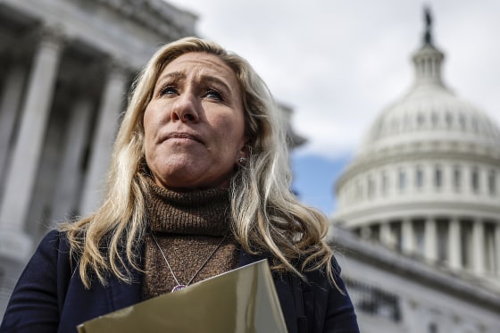 Image: Rep. Marjorie Taylor Green, R-Ga., speaks to reporters as she leave the U.S. Capitol on Jan. 27, 2023.
