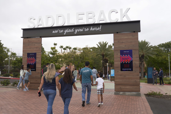 Congregants arrive to hear Pastor Andy Wood give a sermon on Sunday, Oct. 16, 2022, at Saddleback Church in Lake Forest, Calif. Wood was recently announced as founding Pastor Rick Warren's successor to the church, which is the second largest in the Southern Baptist Convention, regularly drawing in about 2,500 people with more online every Sunday.