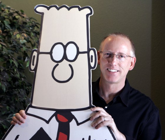 Scott Adams with a cutout of Dilbert in his studio in Dublin, Calif.,