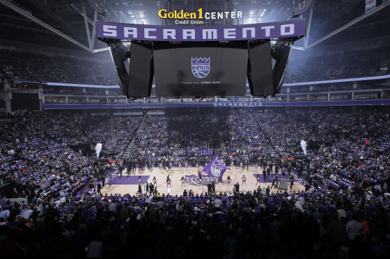 Sacramento Kings fans watch a game against the Phoenix Suns in Sacramento, Calif.