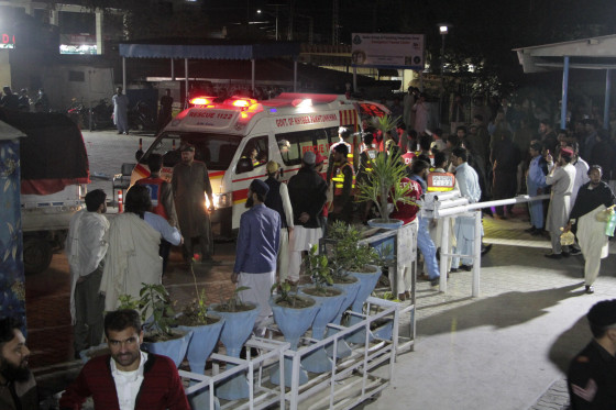 Rescue workers unload earthquake victims from an ambulance at a hospital in Saidu Sharif, a town Pakistan's Swat valley, Tuesday, March 21, 2023.