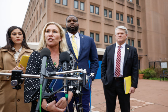 WASHINGTON, DC - MARCH 24: Rep. Marjorie Taylor Greene (R-GA) talks to the media along with Rep. Anna Paulina Luna (R-FL), Rep. Byron Donalds (R-FL) and Rep. Mike Collins (R-GA) as the Congressional Integrity Project video truck showing 12 minutes of footage from the January 6th Insurrection drives around the DC Department of Corrections on March 24, 2023 in Washington, DC. The Congressional Integrity Project mobile billboard was outside the jail protesting as Rep. Marjorie Taylor Greene lead a tour of the jail with members of congress where some Jan. 6 defendants are being held on March 24, 2023 in Washington, DC.