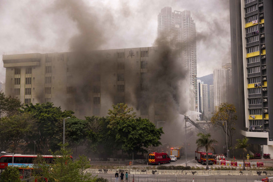 Hong Kong firefighters were battling a blaze Friday at a warehouse that forced more than 3,000 people to evacuate, including students, police said.
