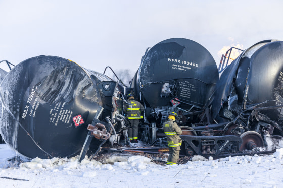 Emergency personnel work at crash site near Raymond, Minn.