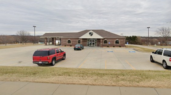 A 78-year-old woman was taken into custody after allegedly robbing Goppert Financial Bank in Pleasant Hill, Mo.