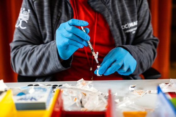 The lead nurse prepares a syringe with a Covid-19 vaccine at the Peoples Congregational United Church of Christ, the site of the Ward 4 DC Covid Center, in Washington, D.C. on March 31, 2023.