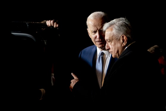 President Joe Biden speaks with Mexican President Andres Manuel Lopez Obrador as he arrives at the Felipe Angeles international airport in Zumpango, Mexico, on Jan. 8, 2023.