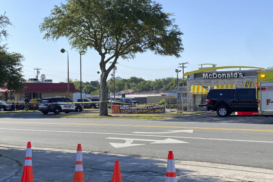 Police investigate a shooting at a McDonald's restaurant on May 4, 2023, in Moultrie, Ga.