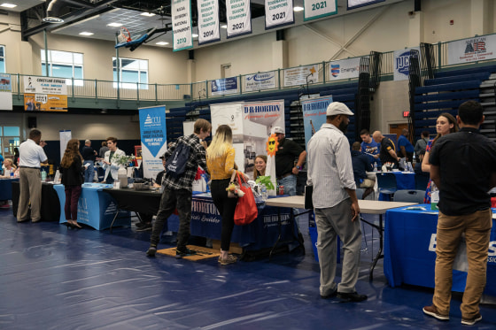 People attend a career fair at a community college in Bolivia, N.C.