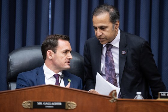 Rep. Mike Gallagher and Rep. Raja Krishnamoorthi speak in the Rayburn Building in Washington, D.C.,