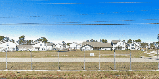 A stretch of road in Gulfport, Miss., before and after shipping containers were installed to protect against gun violence.