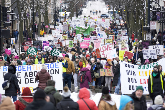 FILE - Protesters make their way to the Wisconsin Capitol Rotunda during a march supporting overturning Wisconsin's near total ban on abortion on Jan. 22, 2023, in Madison, Wis. A Wisconsin judge is set to hear arguments Thursday, May 4, in a lawsuit challenging the state's 174-year-old abortion ban, a statute held in abeyance for nearly five decades until the U.S. Supreme Court struck down Roe v. Wade last year.