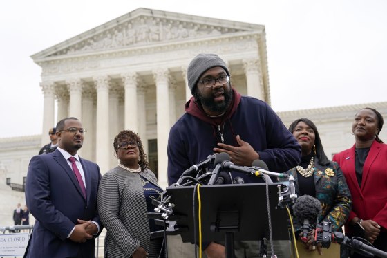 Evan Milligan, plaintiff in Merrill v. Milligan, an Alabama redistricting case, speaks outside the Supreme Court on Oct. 4, 2022.