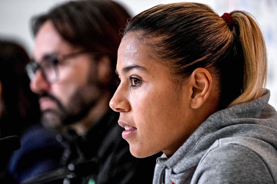 Image: Morocco's captian Ghizlane Chebbak and coach Reynald Pedros during a press conference in Melbourne on July 23, 2023