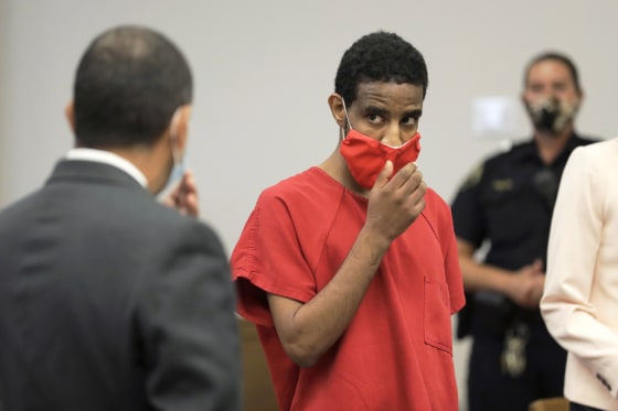 FILE - Dawit Kelete, looks toward his attorney, Francisco Duarte, left, as he appears in King County Superior Court, Wednesday, July 22, 2020, in Seattle, for his arraignment on felony charges of vehicular homicide, vehicular assault and reckless driving. Kelete, who hit two protesters, killing one of them, with his car during a Black Lives Matter demonstration in Seattle in 2020 has pleaded guilty to multiple felonies. The Seattle Times reports 30-year-old Kelete pleaded guilty on Thursday, July 27, 2023, to vehicular homicide in the death of Summer Taylor. (AP Photo/Ted S. Warren, File)