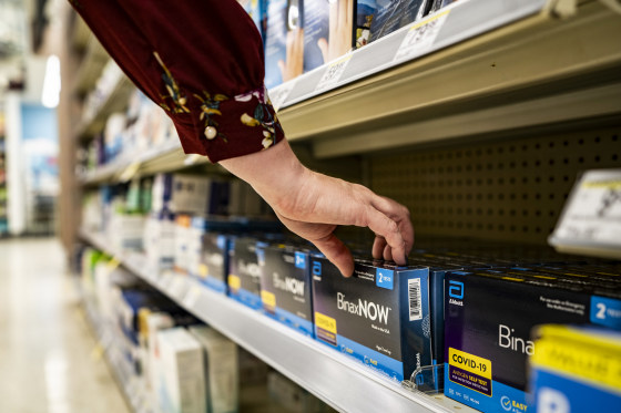 A shopper reaches for a box of Covid-19 tests in Dallas on Sept. 29, 2022.