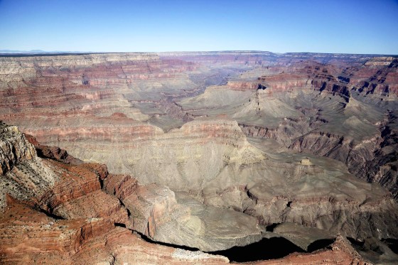 The Grand Canyon National Park is covered in the morning sunlight as seen from a helicopter near Tusayan, Ariz., Oct. 5, 2013. A visit from President Joe Biden to Arizona this week is creating buzz that longtime advocates for banning mining on land around the Grand Canyon could be getting their wish. Biden’s first stop Tuesday will be near the Grand Canyon, where he’s expected to announce plans for a new national monument to preserve more than 1,562 square miles.